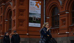 Афиша выствки Международного конкурса фотожурналистики имени Андрея Стенина на Государственном историческом музее