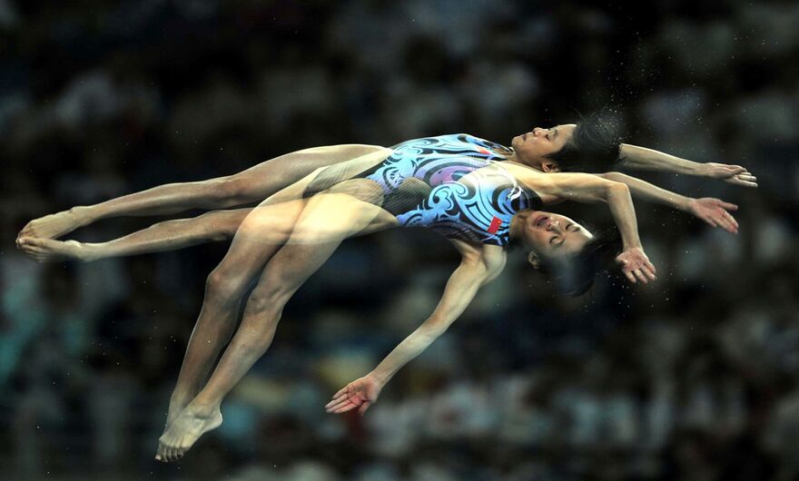 Китайская прыгунья в воду Чэнь Жолинь, олимпийская чемпионка по прыжкам в воду с 10-метровой вышки, во время Олимпийских игр 2008 года в Пекине. 
